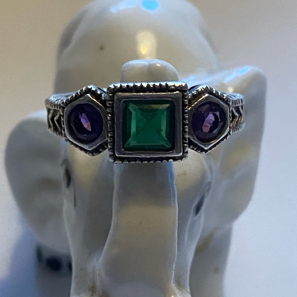 Silver ring with stones.